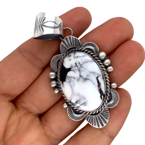 Image of sold Navajo White Buffalo Oval Stone Old-Style Stamped Sterling Silver Border P.endant - Mary Ann Spencer - Native American