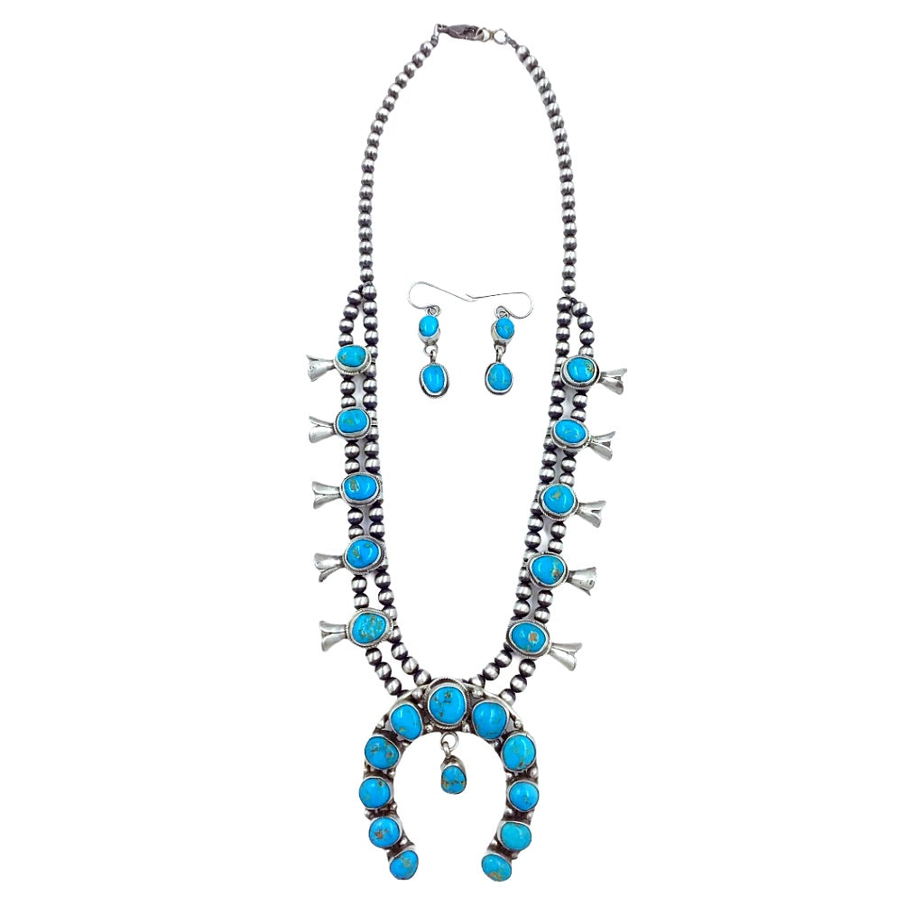 Turquoise squash blossom necklace 2025 meaning